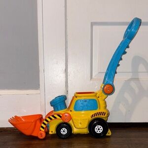 Yellow and Orange Push and Go Toy Excavator